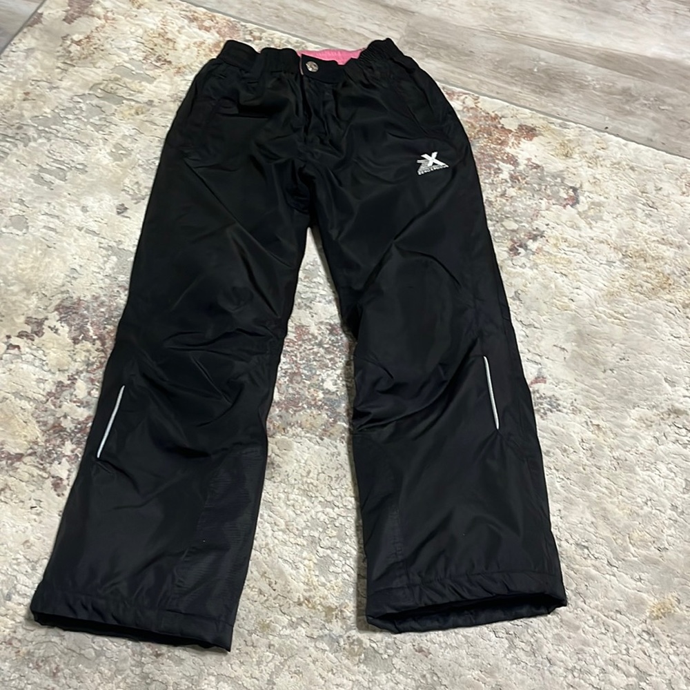 Black snow pants not worn very much and pink inside